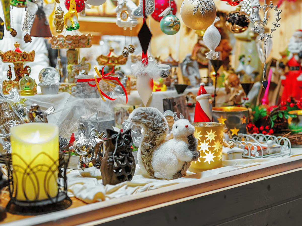 Christmas products are displayed on a market stall